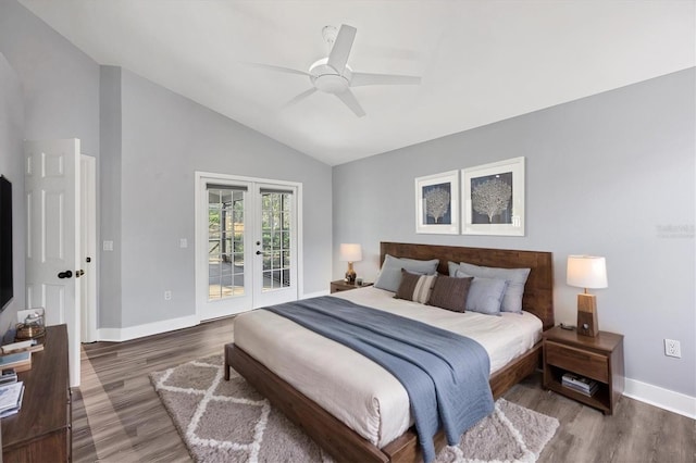 bedroom with access to exterior, french doors, vaulted ceiling, wood finished floors, and baseboards