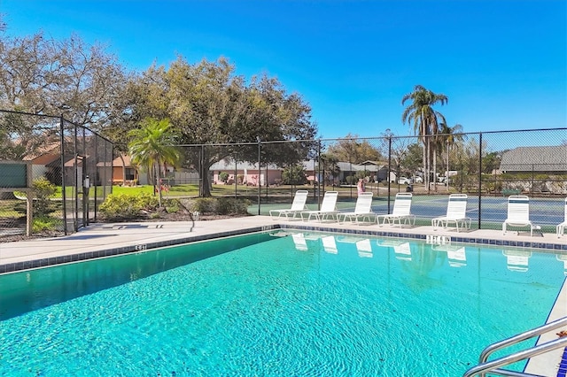 community pool with fence