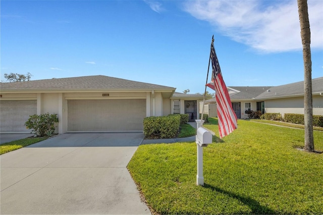 ranch-style house with a garage, driveway, a front yard, and stucco siding