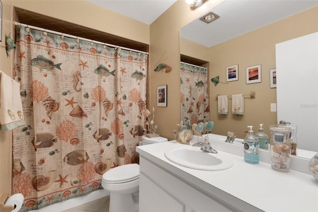 bathroom with toilet, curtained shower, tile patterned flooring, and vanity