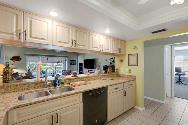 kitchen featuring visible vents, a raised ceiling, dishwasher, a sink, and light tile patterned flooring