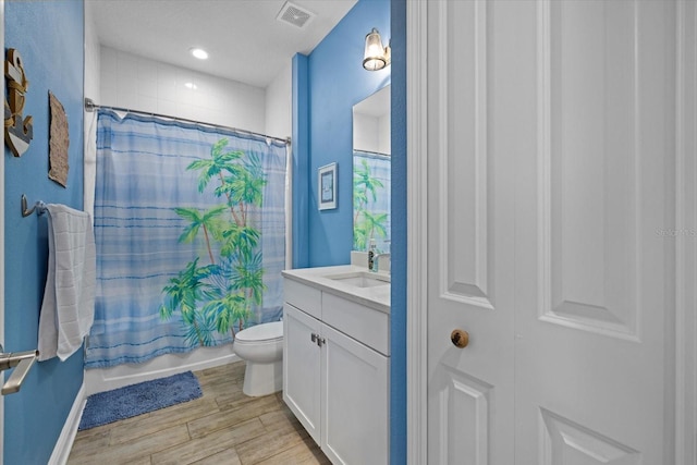 full bath featuring visible vents, toilet, shower / tub combo, vanity, and wood finished floors