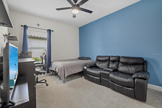 bedroom with carpet floors, baseboards, and a ceiling fan