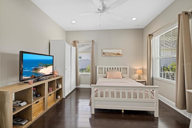 bedroom with dark wood-style floors, recessed lighting, baseboards, and a ceiling fan