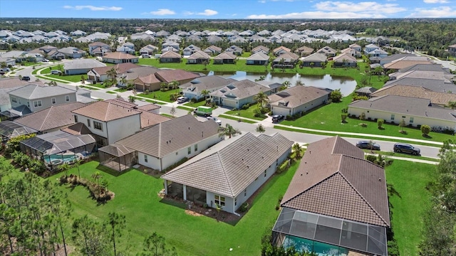 aerial view featuring a water view and a residential view