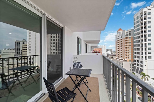 balcony featuring a view of city