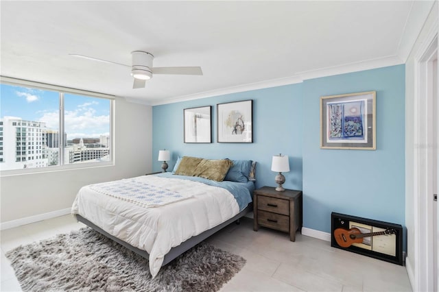 bedroom featuring light tile patterned floors, crown molding, baseboards, and ceiling fan