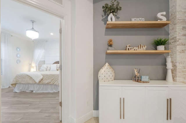 interior details with wood finished floors and baseboards