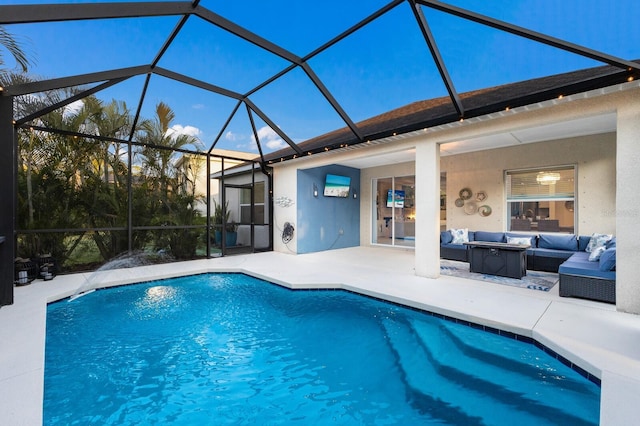 pool with a lanai, a patio area, and an outdoor living space