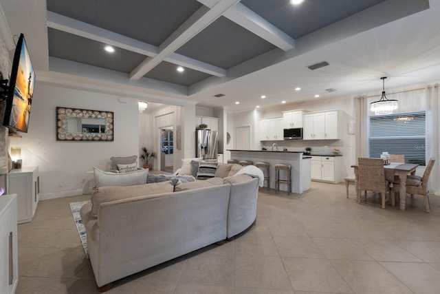 living room featuring light tile patterned floors, visible vents, coffered ceiling, beamed ceiling, and recessed lighting