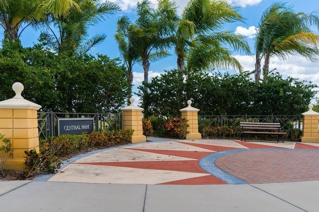 view of gate with fence