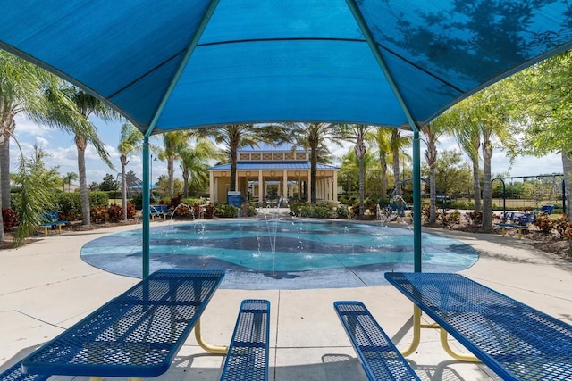 community pool featuring a patio