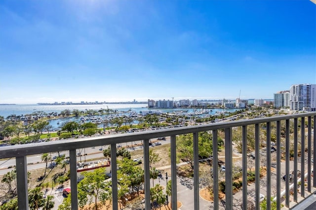 balcony with a city view and a water view