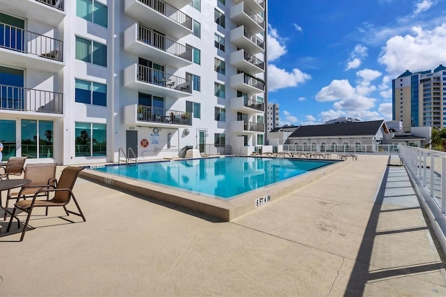 pool featuring a patio area