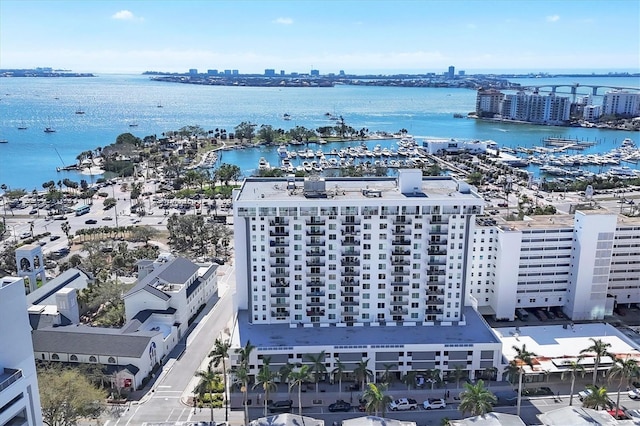 bird's eye view featuring a view of city and a water view