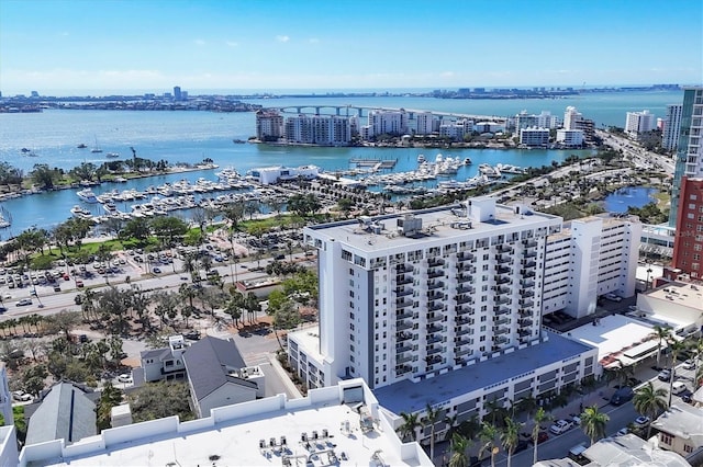 drone / aerial view with a water view and a city view