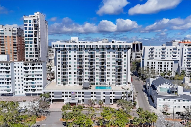 birds eye view of property with a city view