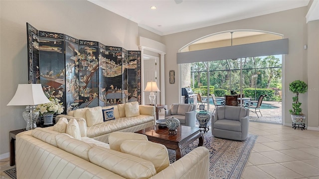 tiled living room with baseboards, crown molding, and recessed lighting