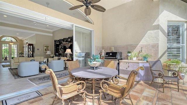 view of patio / terrace featuring ceiling fan and grilling area