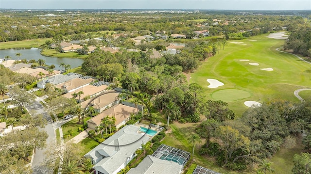 aerial view featuring a water view, a residential view, and golf course view