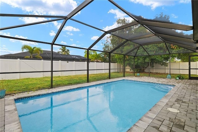 view of pool with a lanai, a fenced backyard, a fenced in pool, and a patio