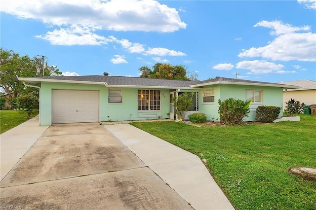 ranch-style home featuring concrete driveway, a front lawn, an attached garage, and stucco siding