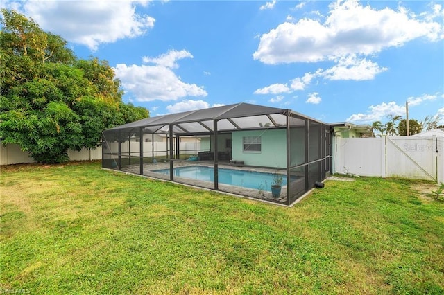 view of pool featuring a fenced backyard, a gate, a fenced in pool, and a yard