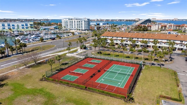 bird's eye view featuring a water view and a city view