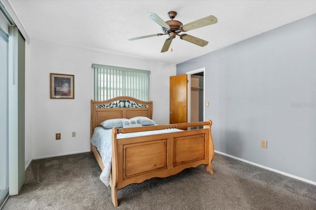 bedroom with carpet, ceiling fan, and baseboards