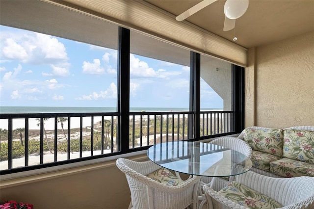 5740 Midnight Pass Rd Unit 402, Sarasota, FL 34242 - balcony featuring a water view, ceiling fan, an outdoor living space, and a view of the beach