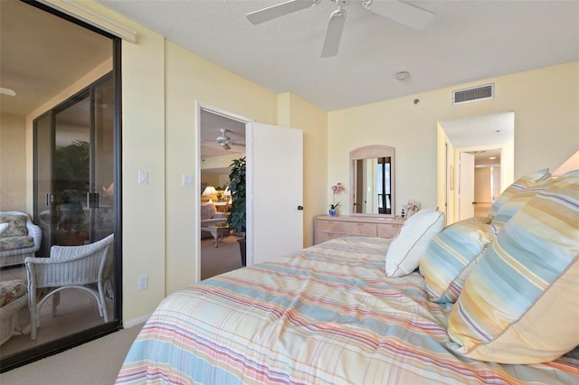 5740 Midnight Pass Rd Unit 402, Sarasota, FL 34242 - carpeted bedroom with ceiling fan, a closet, visible vents, and a textured ceiling