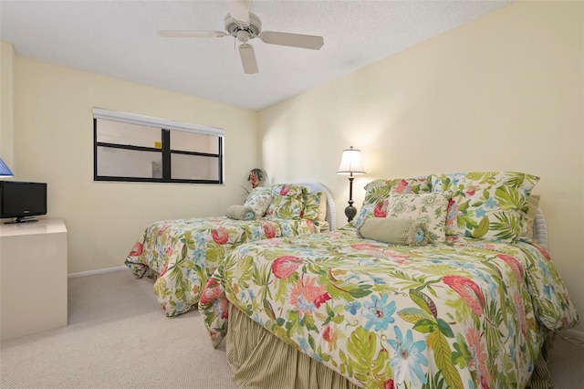 5740 Midnight Pass Rd Unit 402, Sarasota, FL 34242 - bedroom featuring carpet floors, a ceiling fan, and baseboards
