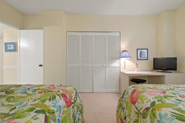 5740 Midnight Pass Rd Unit 402, Sarasota, FL 34242 - carpeted bedroom with a closet