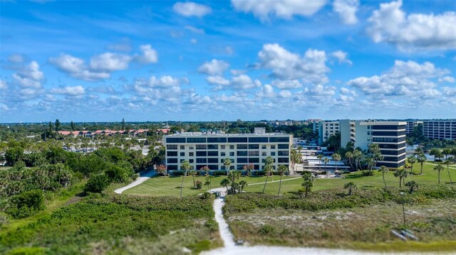 5740 Midnight Pass Rd Unit 402, Sarasota, FL 34242 - birds eye view of property featuring a city view
