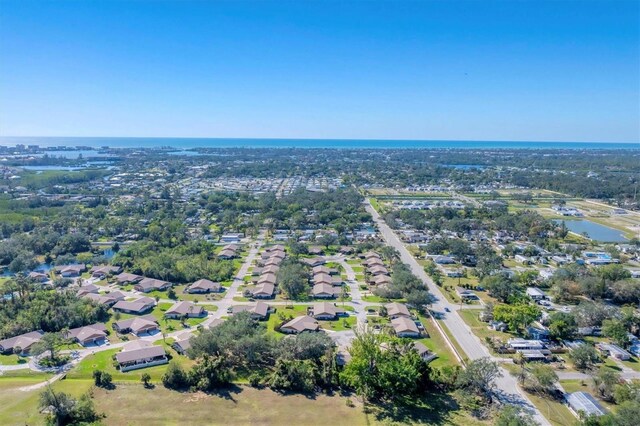 aerial view with a residential view and a water view