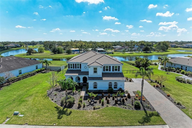 birds eye view of property featuring a water view