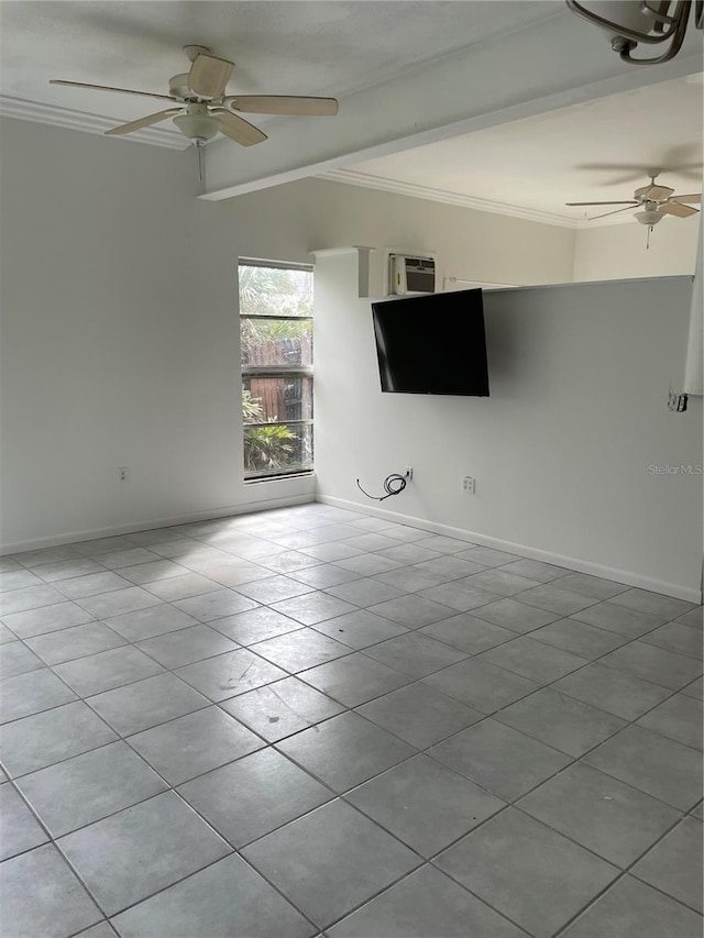 unfurnished living room featuring baseboards and ornamental molding