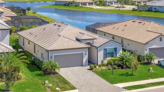 bird's eye view featuring a water view and a residential view