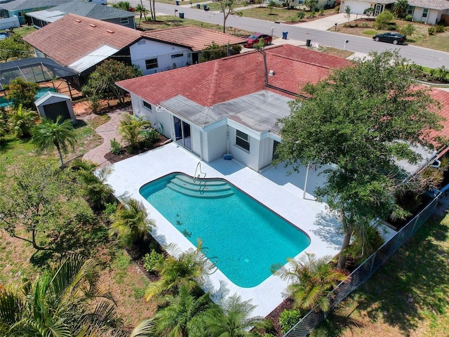 pool featuring a patio area and a fenced backyard