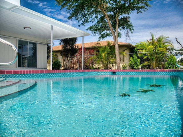 view of swimming pool featuring a swimming pool