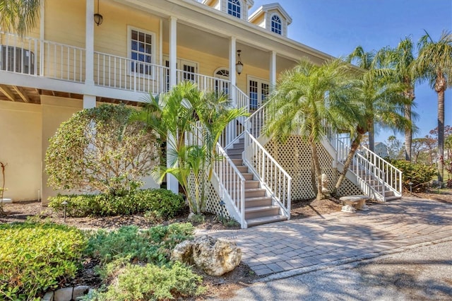 view of exterior entry with covered porch