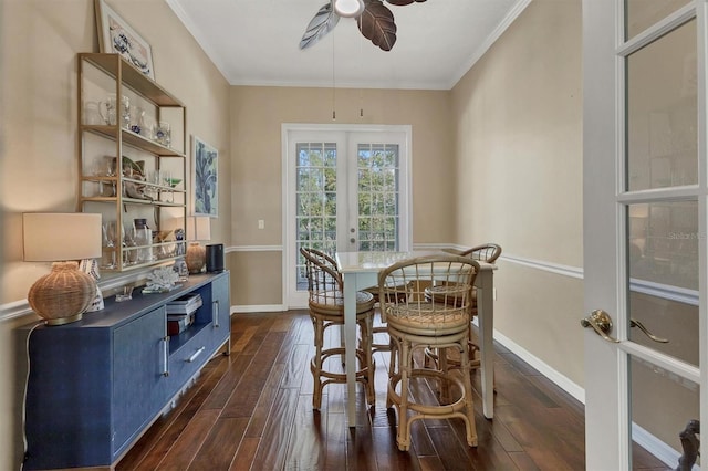 dining space with a ceiling fan, baseboards, french doors, dark wood-style floors, and crown molding