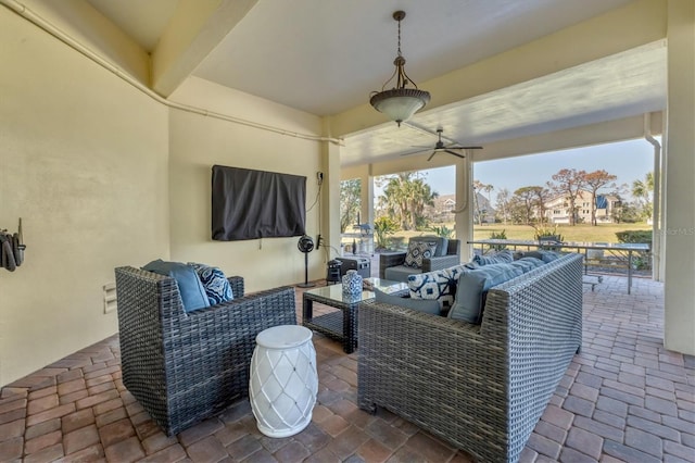 view of patio with a ceiling fan and outdoor lounge area