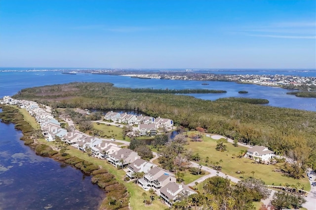 bird's eye view featuring a water view and a residential view