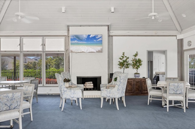 92 Tidy Island Blvd, Bradenton, FL 34210 - carpeted dining room with a brick fireplace and vaulted ceiling