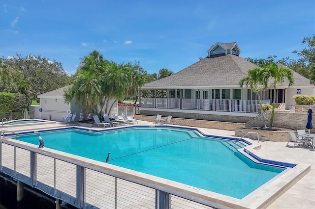 92 Tidy Island Blvd, Bradenton, FL 34210 - community pool with a hot tub and a patio area