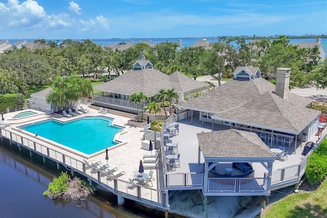 92 Tidy Island Blvd, Bradenton, FL 34210 - community pool with a hot tub, a water view, and a gazebo