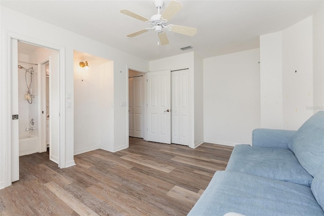 1730 Hudson St, Englewood, FL 34223 - living room with wood finished floors, baseboards, and ceiling fan