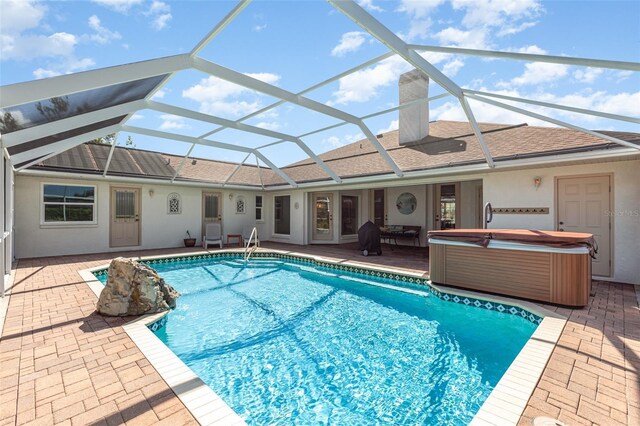 1730 Hudson St, Englewood, FL 34223 - swimming pool with a hot tub, a patio, and a lanai