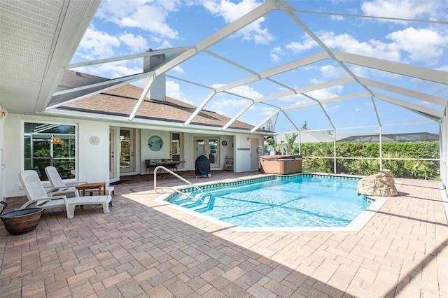 1730 Hudson St, Englewood, FL 34223 - swimming pool with a hot tub, a patio, french doors, and glass enclosure